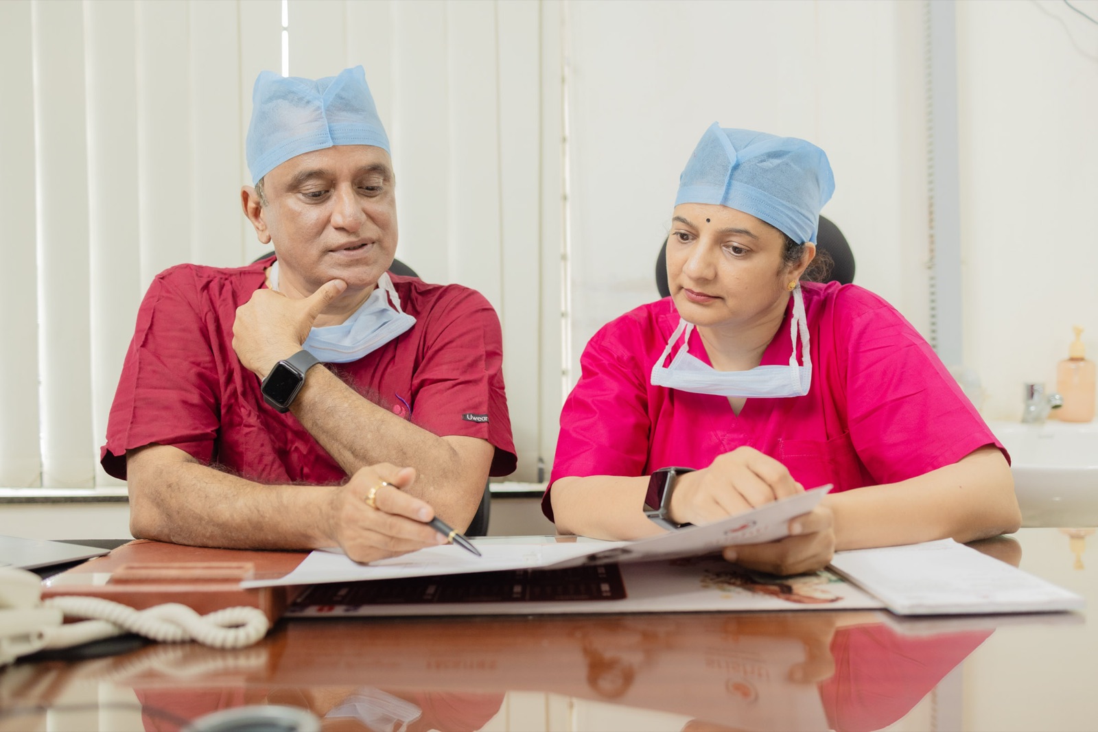 Dr. Shankar and Dr. Priya reviewing a patient case together at Srishti SAFE