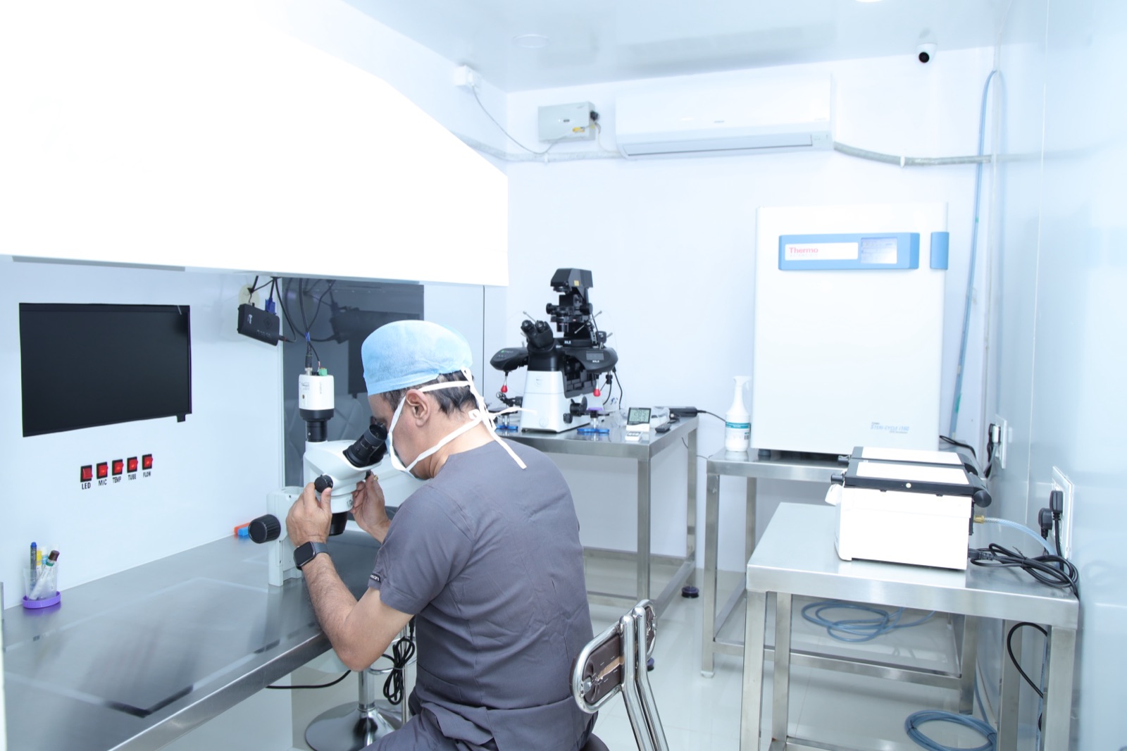 Embryologist working at the ICSI workstation in the Srishti SAFE IVF laboratory