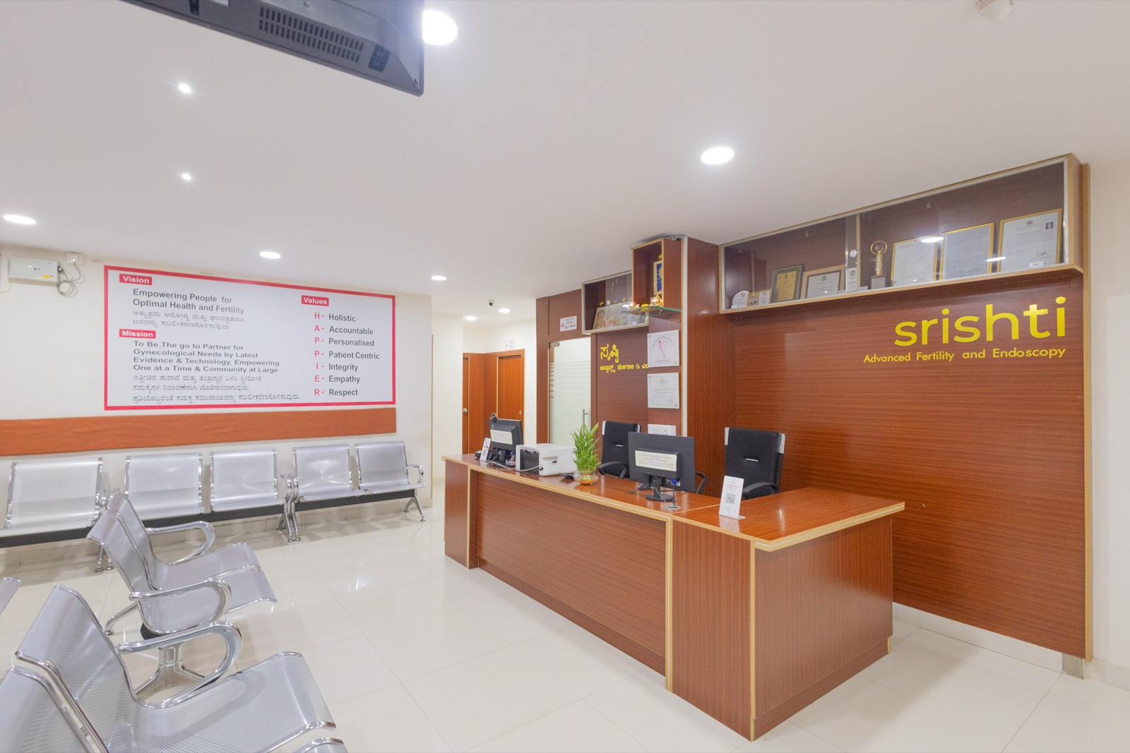 Srishti SAFE vision, mission and HAPPIER values displayed at the reception, Hubli